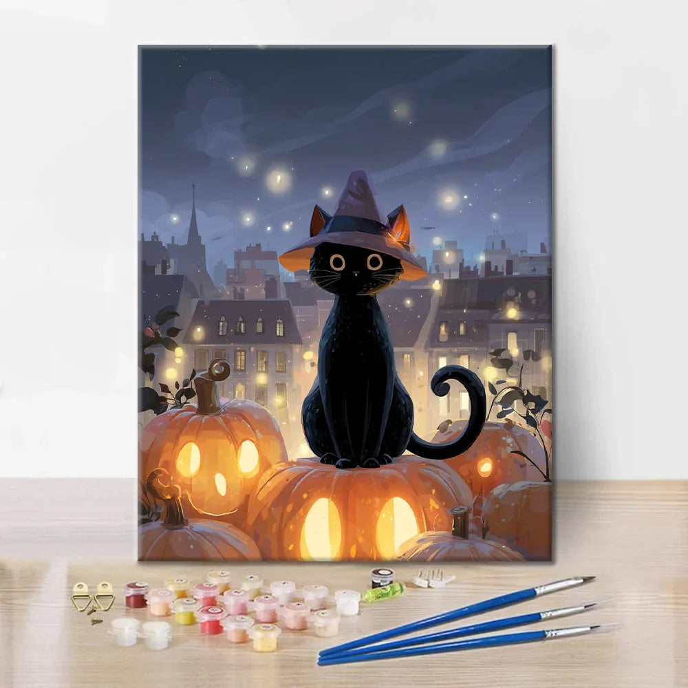Gato mago sentado en una calabaza - Pintar por números