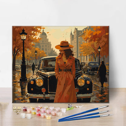 Mujer al lado de un coche clásico en otoño – Pintura por números
