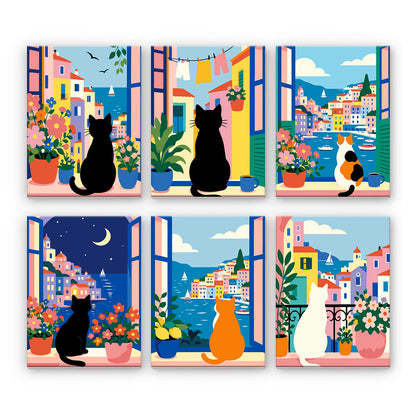 Gatos en las ventanas mediterráneas