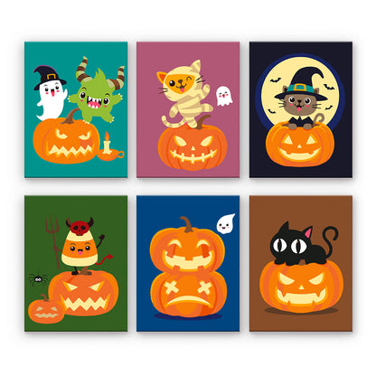 Gatos y calabazas de Halloween