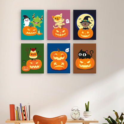Gatos y calabazas de Halloween